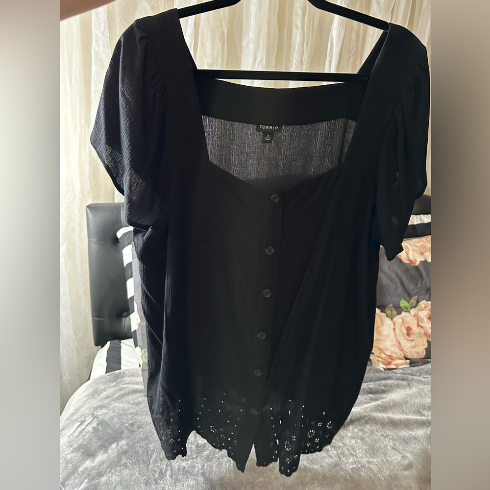 Black button blouse with crochet detailing at the bottom